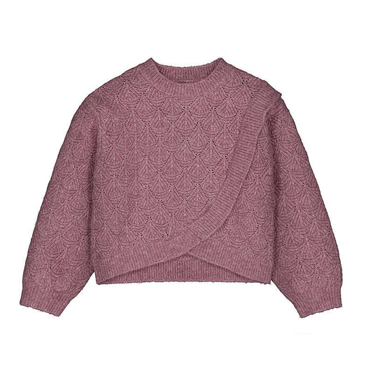 A berry pink cable-knit sweater with a unique asymmetrical wrap-style hem, laid flat against a solid white background.