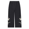 Black pants with floral embroidery