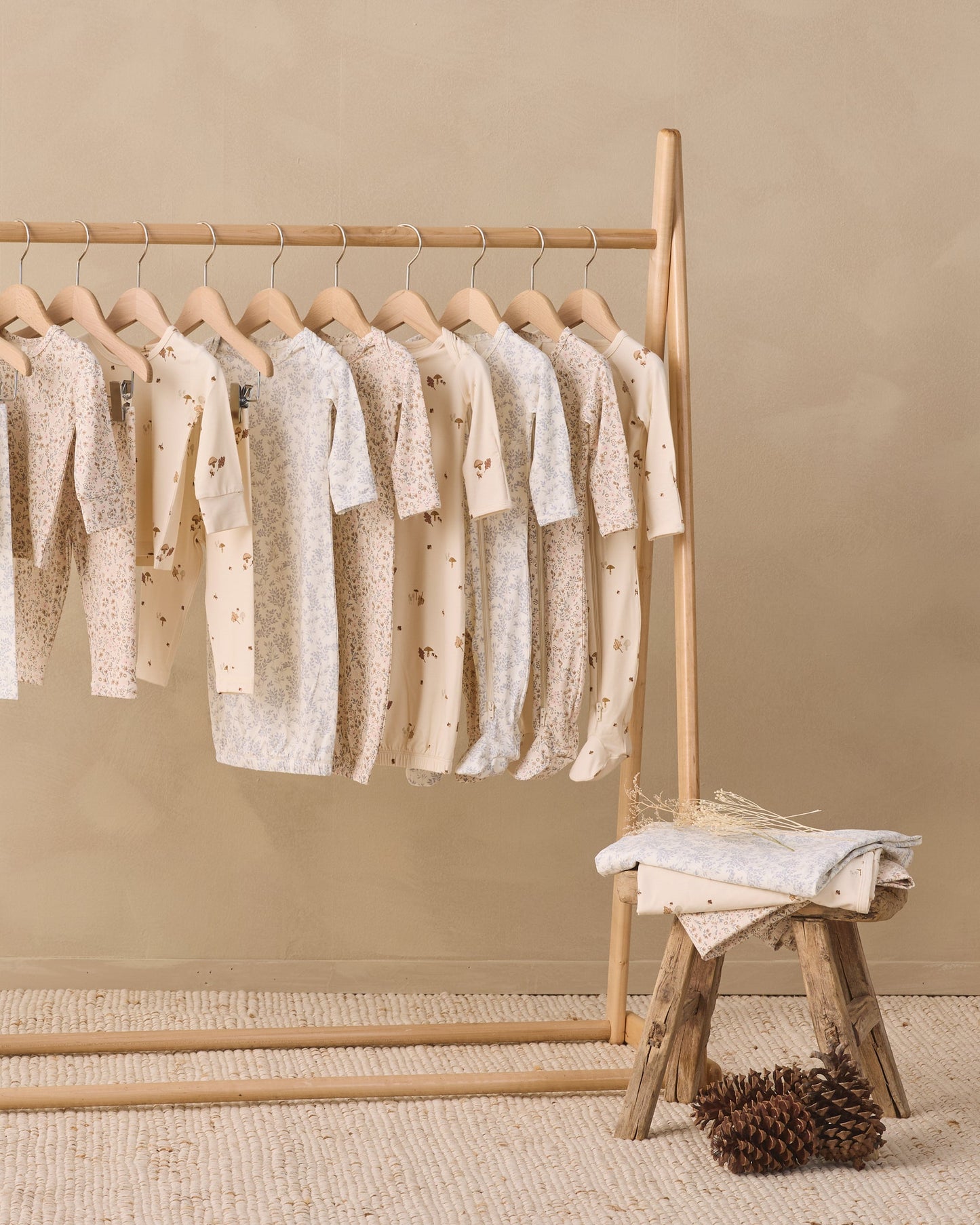 Bloom Bamboo Zip Footie, lifestyle photo of baby