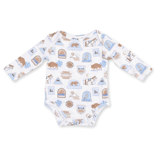 Baby onesie with animal pattern on a white background