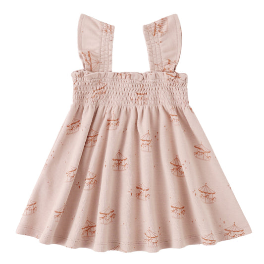 Pink smocked dress with carousel pattern 