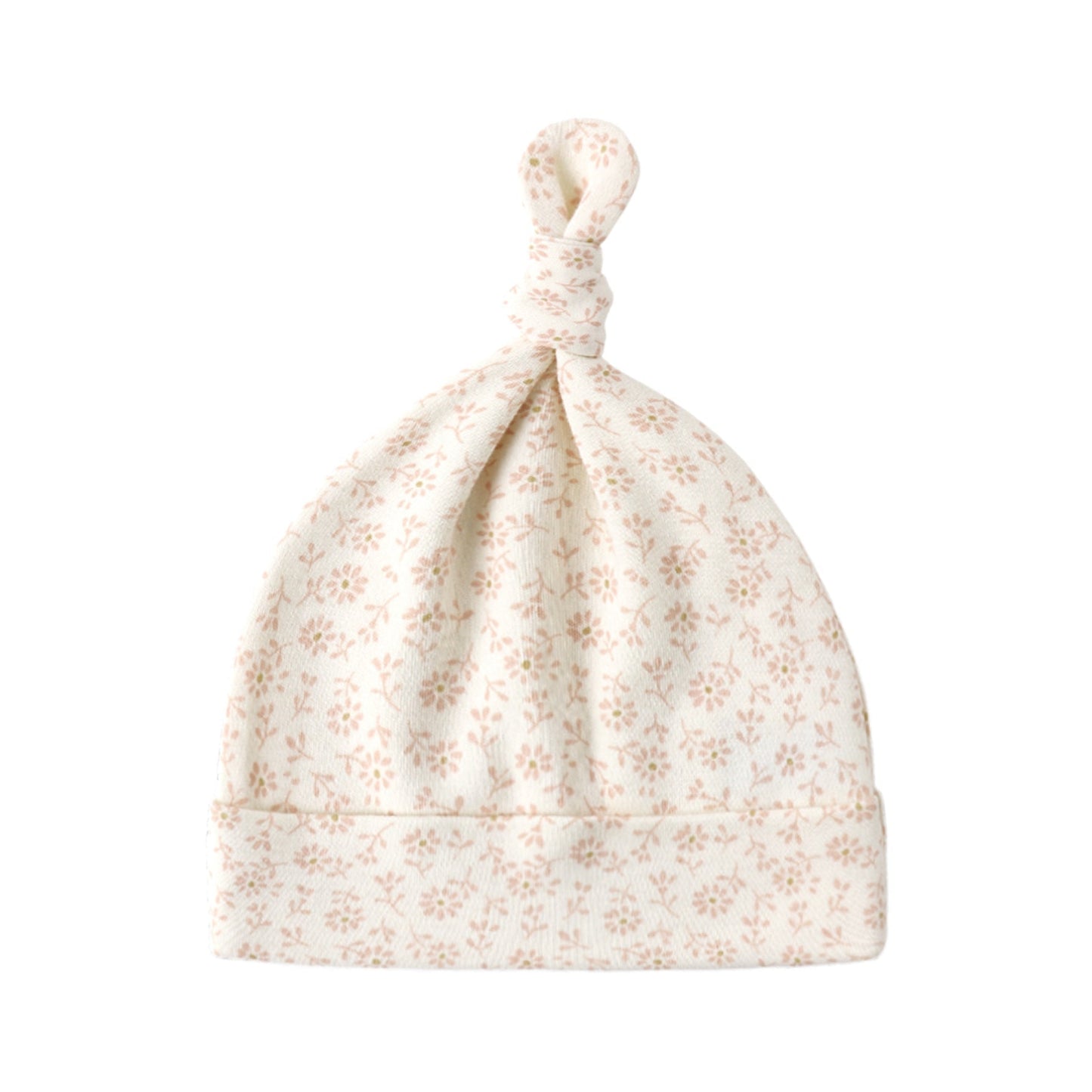 Ditsy floral patterned baby hat on a white background