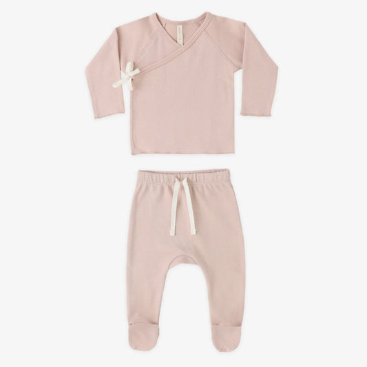 Blush baby set with wrap top and footed pants.