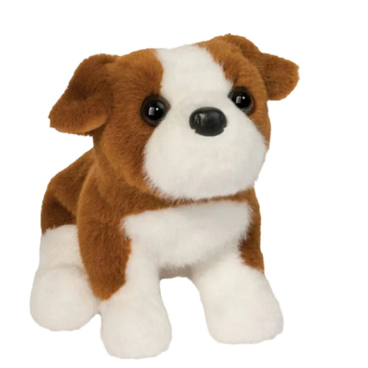 Plush toy dog with brown and white fur on a white background