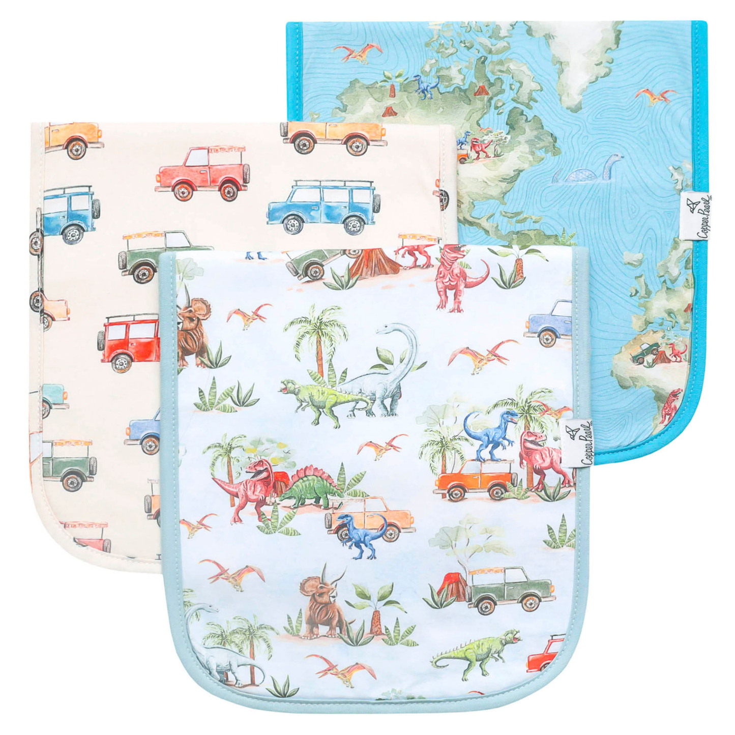 Three burp cloths featuring dinosaurs, vehicles, and map prints