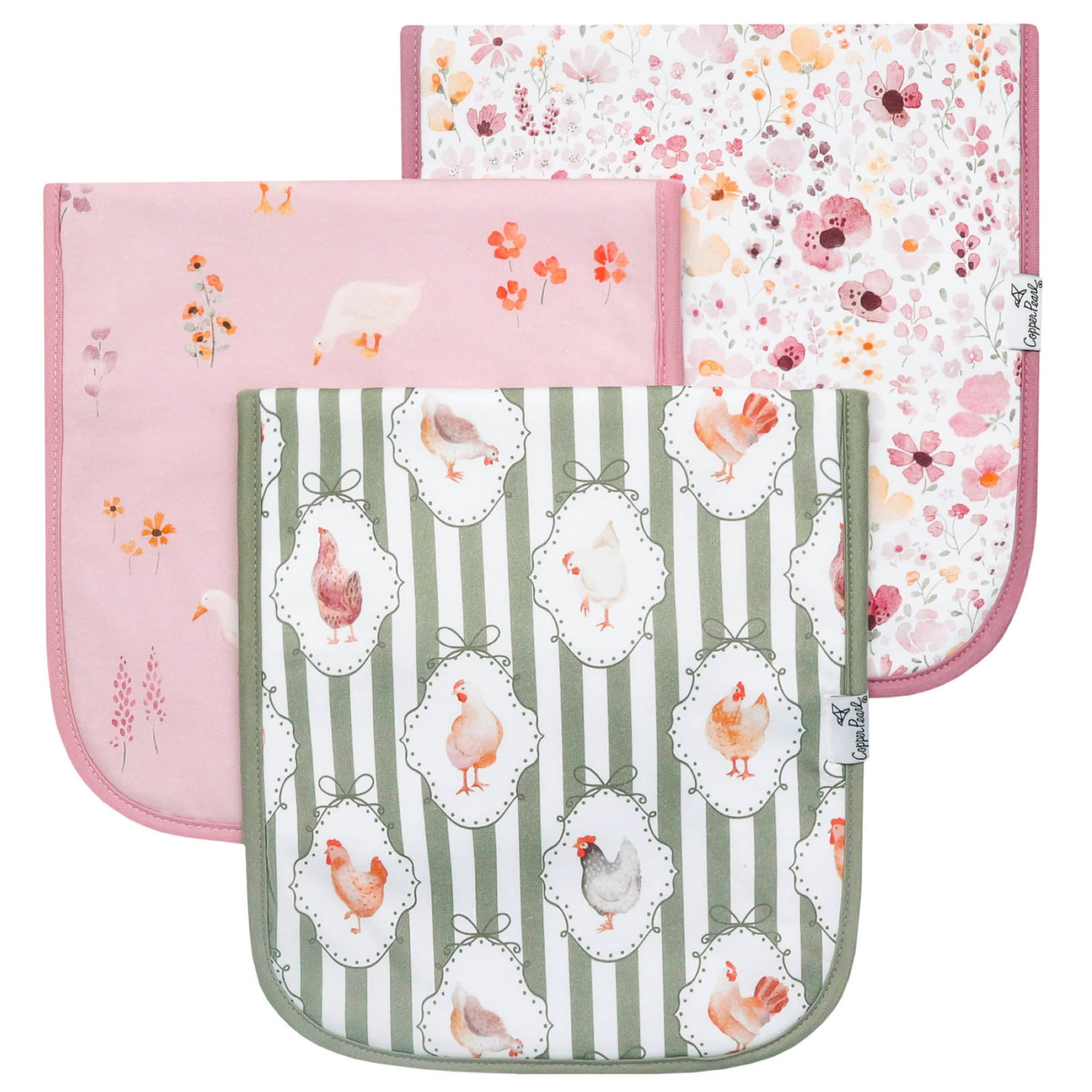 Three burp cloths with floral, duck, and chicken prints