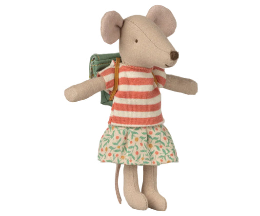 Stuffed mouse toy wearing a striped dress and holding a book on a white background