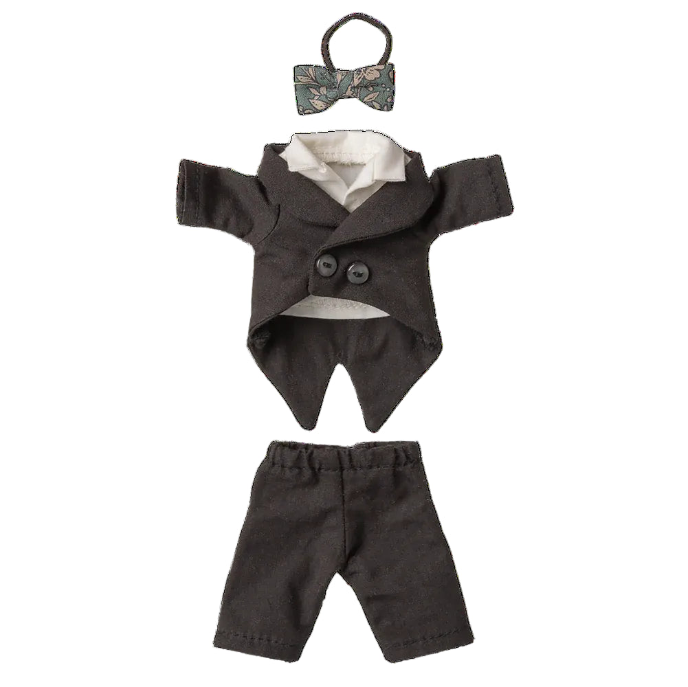 Doll outfit with jacket, pants, and bow tie on a white background