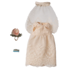 Vintage-style lace dress with matching headband on a white background