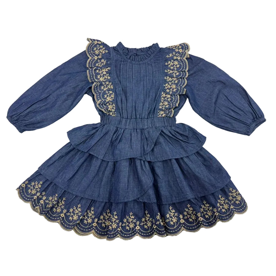 A vintage-style blue dress for girls featuring long puff sleeves, a ruffled high neck, and tiered skirt with gold floral embroidery and scalloped edges.