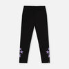 Black cropped leggings with purple embroidered star details on the lower legs, shown flat against a light gray background.