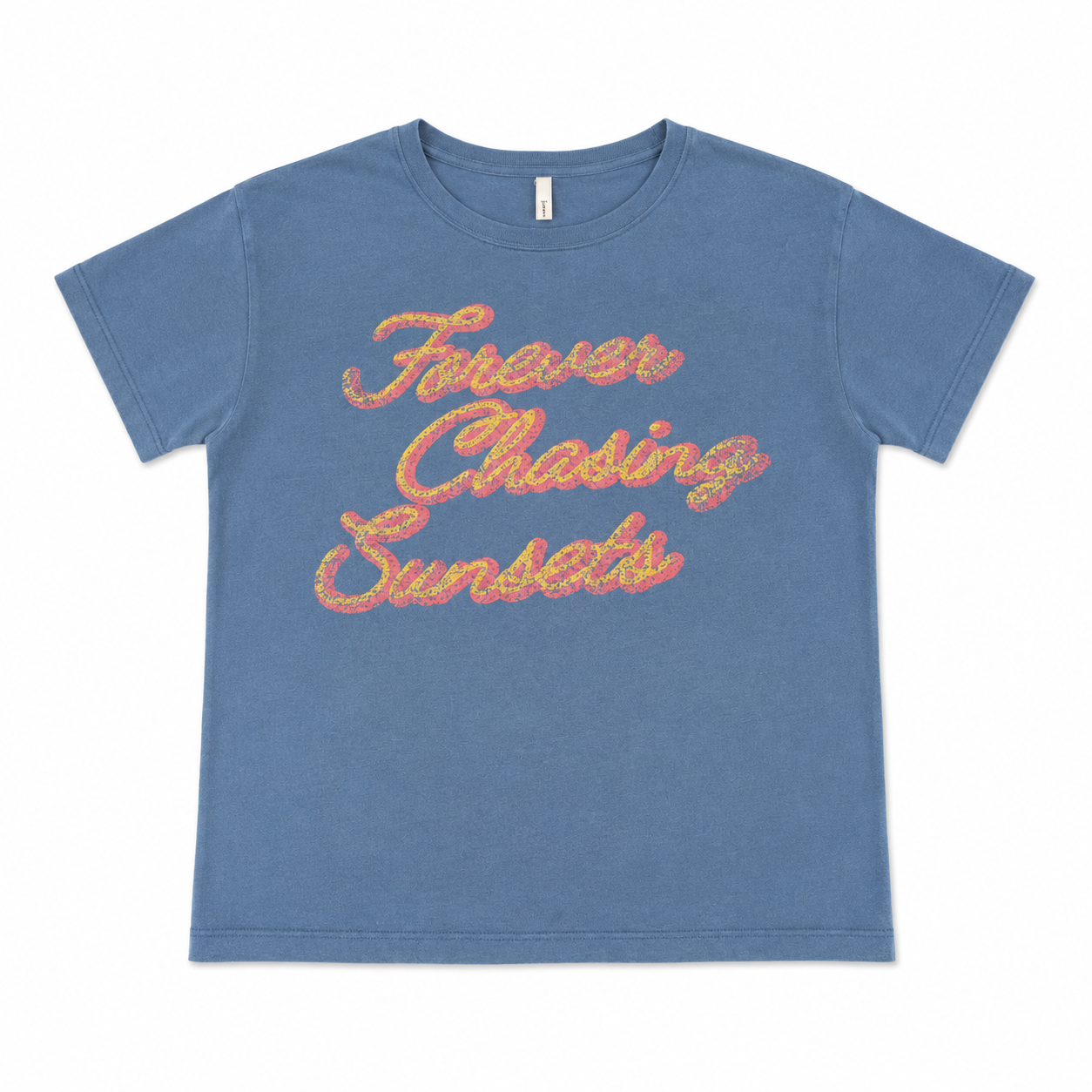 Blue t-shirt with 'Forever Chasing Sunsets' text on a white background