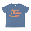 Blue t-shirt with 'Forever Chasing Sunsets' text on a white background