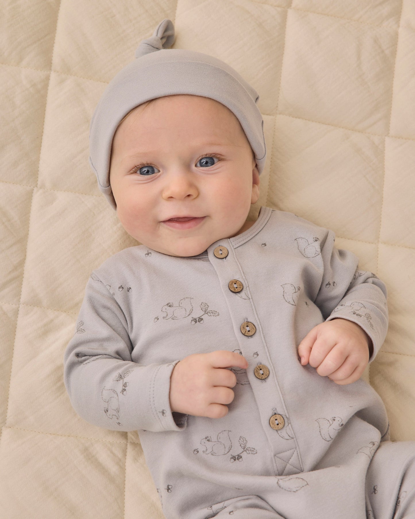Cloud Knotted Hat, studio photo on baby