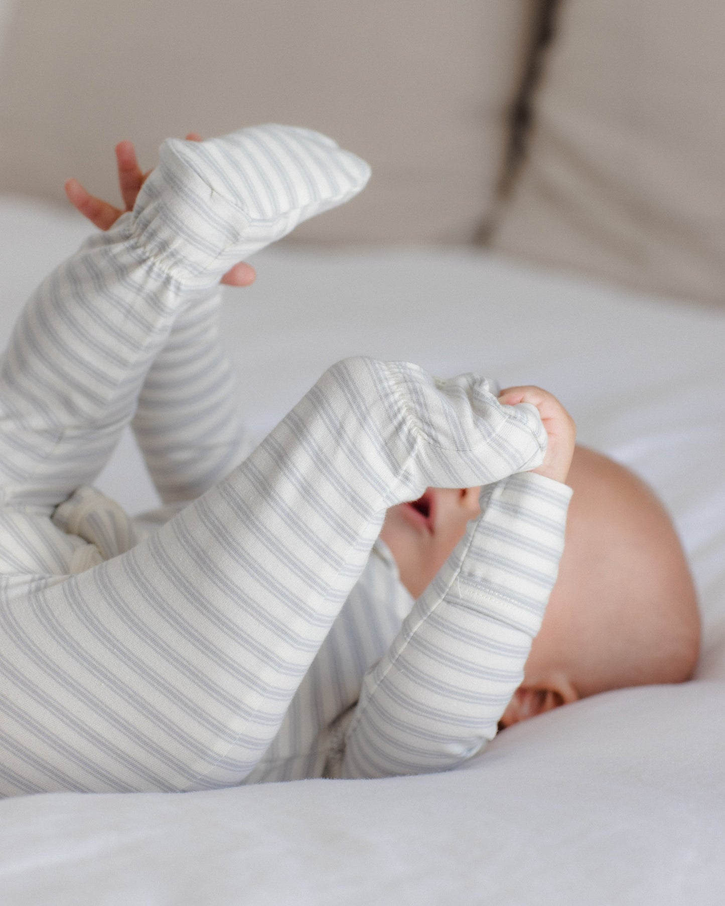 Cloud Stripe Zip Footie, lifestyle photo of baby