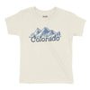 Beige t-shirt with blue mountain and tree graphic and 'Colorado' text on a white background
