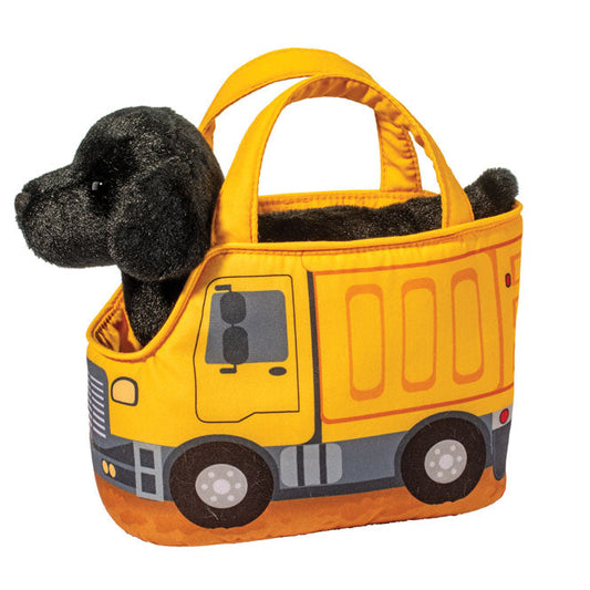 Black stuffed dog in a truck bag