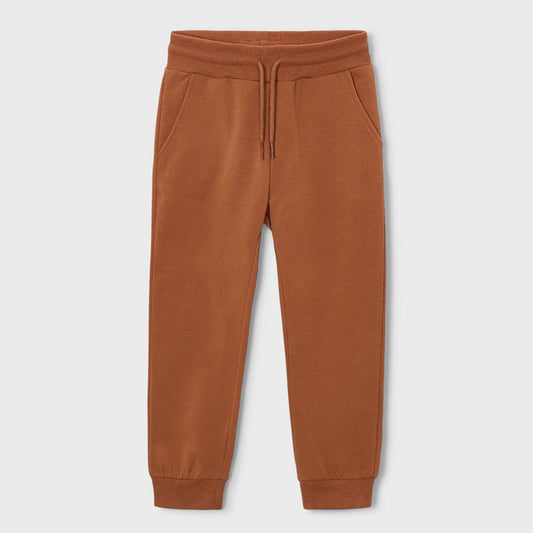Brown sweatpants on a light gray background