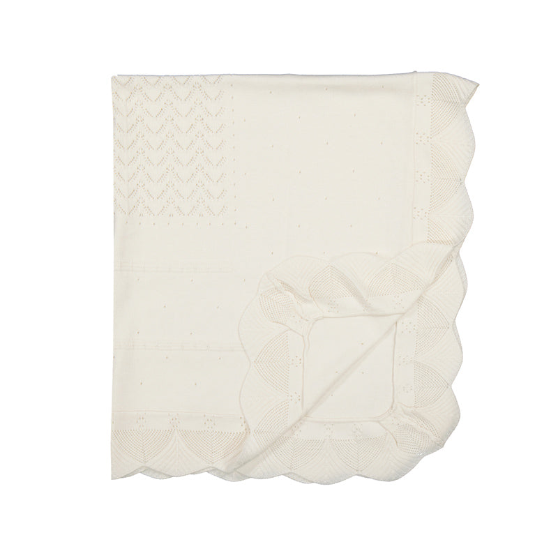 White textured blanket on a white background