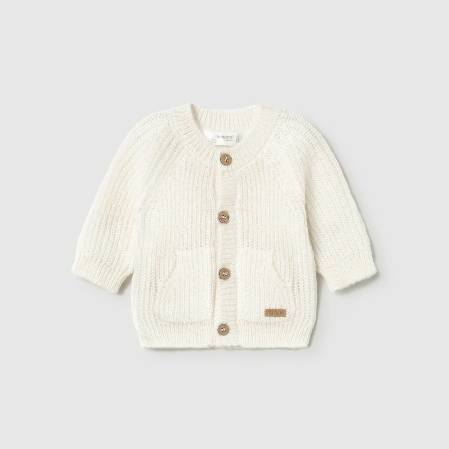 A cream-colored textured knit cardigan sweater with four brown buttons, shown flat on a white background.
