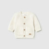 A cream-colored textured knit cardigan sweater with four brown buttons, shown flat on a white background.