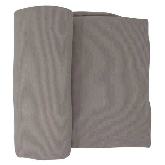 Rolled-up gray fabric on a white background