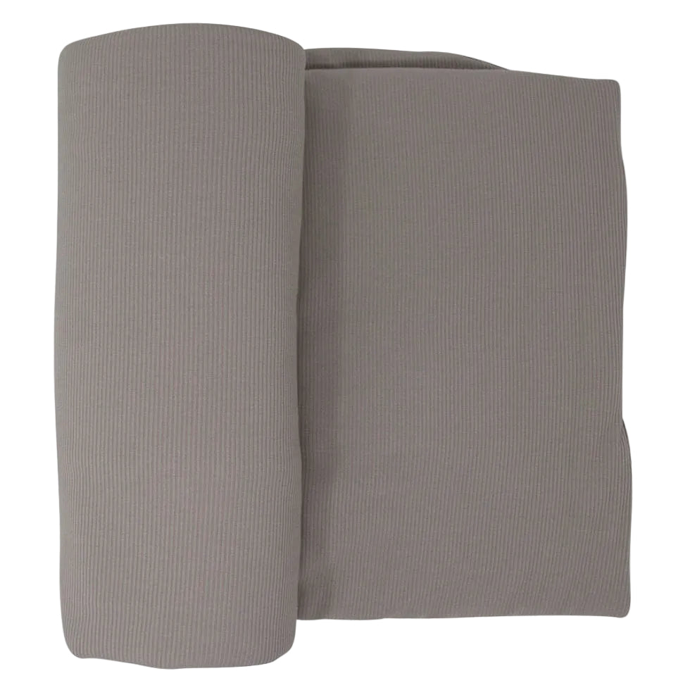 Rolled-up gray fabric on a white background