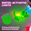 Six colorful light-up dinosaur bath toys on white background.