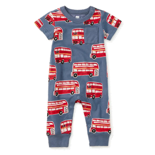 A baby short-sleeve jumpsuit in dusty blue with an all-over print of red double-decker buses, shown flat against a white background.
