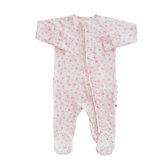 Baby footie with pink floral pattern on a white background