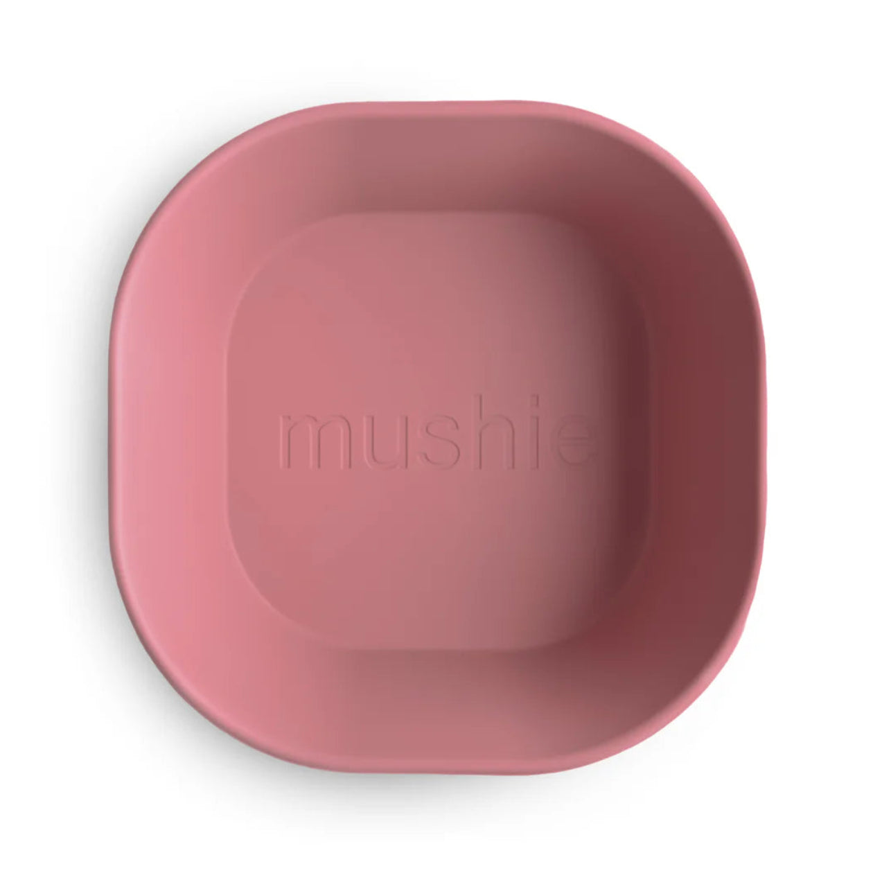 Pink bowl with 'mushie' branding on a white background