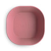Pink bowl with 'mushie' branding on a white background