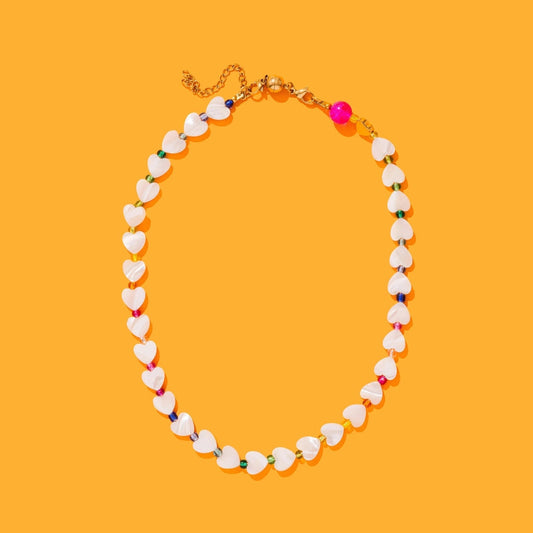 Pearl colored beaded heart necklace