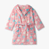 Pink robe with heart pattern on a white background