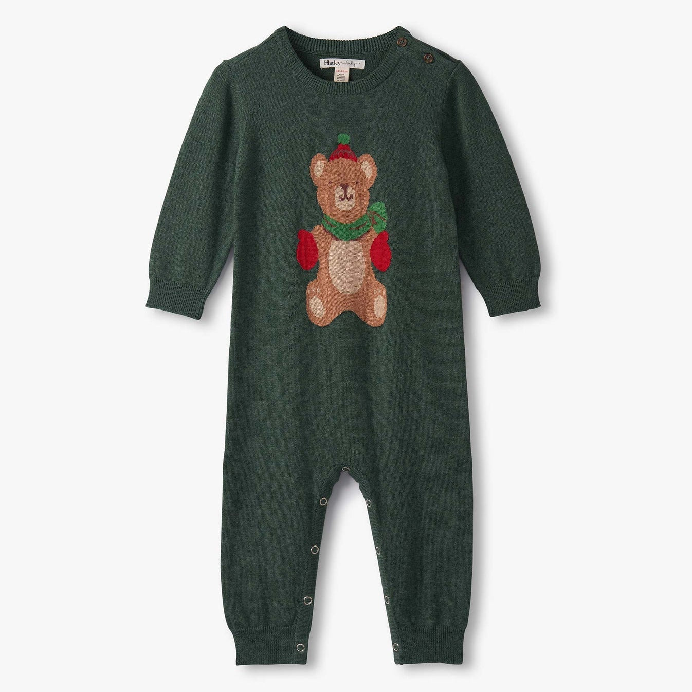 Green baby onesie with teddy bear design on a white background