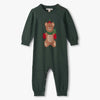 Green baby onesie with teddy bear design on a white background
