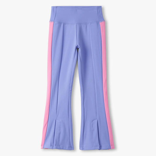 Purple pants with pink side panels on a white background