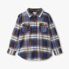 Plaid shirt with blue, white, and brown colors on a white background