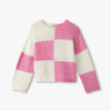 Pink and white checkered sweater on a light gray background