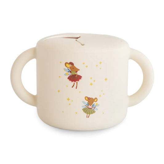 Children's cup with fairy design on a white background
