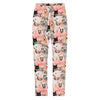 Leggings with dog and bow pattern on a white background