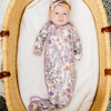 Floral baby knotted gown with purple trim on white