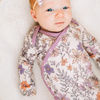Floral baby knotted gown with purple trim on white
