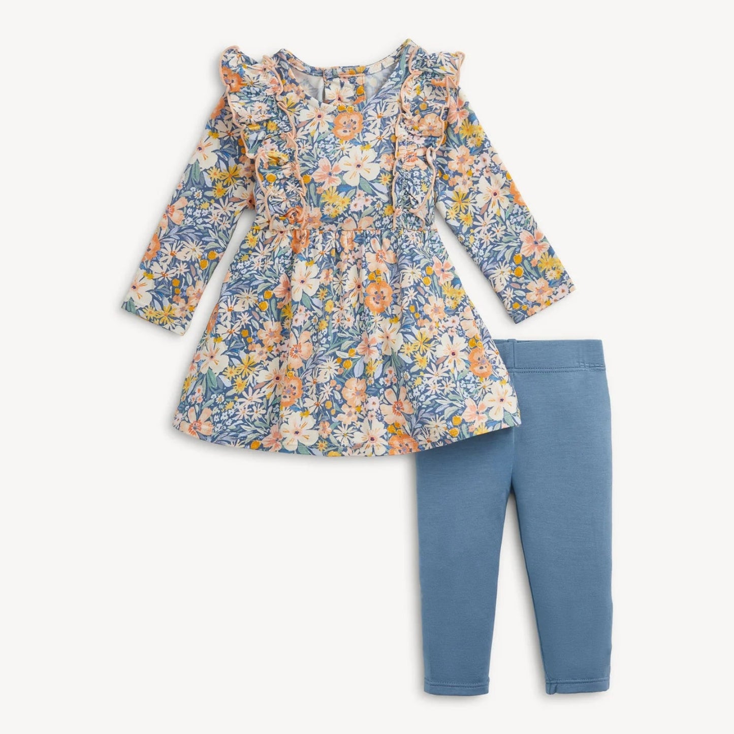 A toddler girl's two-piece outfit set featuring a long-sleeve ruffled floral dress in a blue, yellow, and orange pattern, paired with solid blue leggings, shown on a light off-white background.