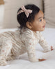 Baby in Floral Vine Zip Footie, lifestyle photo