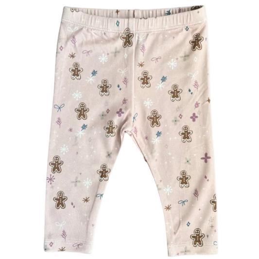 Children's leggings with gingerbread man pattern on a white background