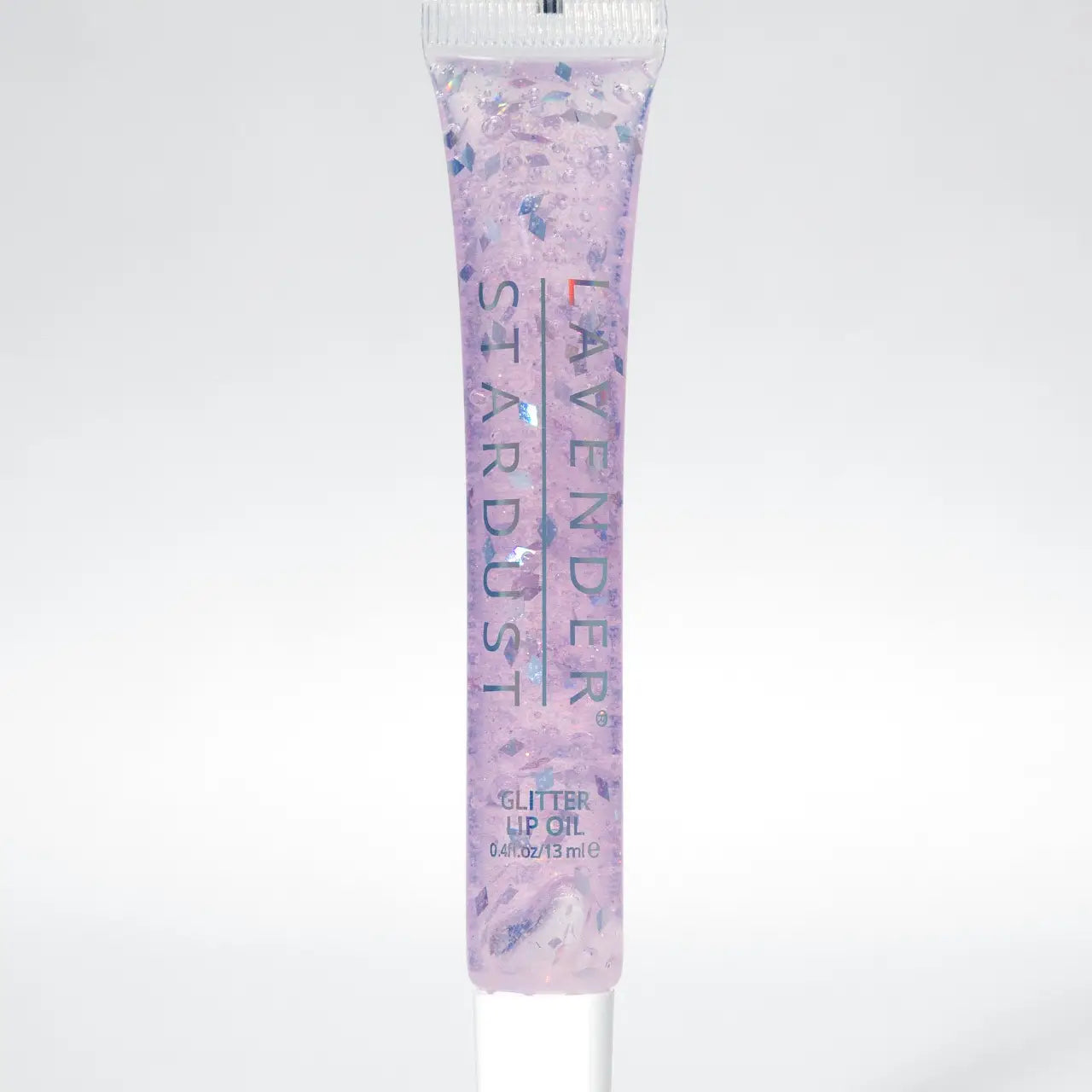 Lavender glitter lip oil tube on a white background