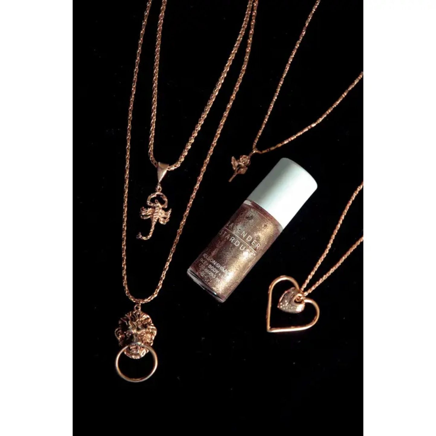 Goldie roll-on shimmer for face, hair, and body