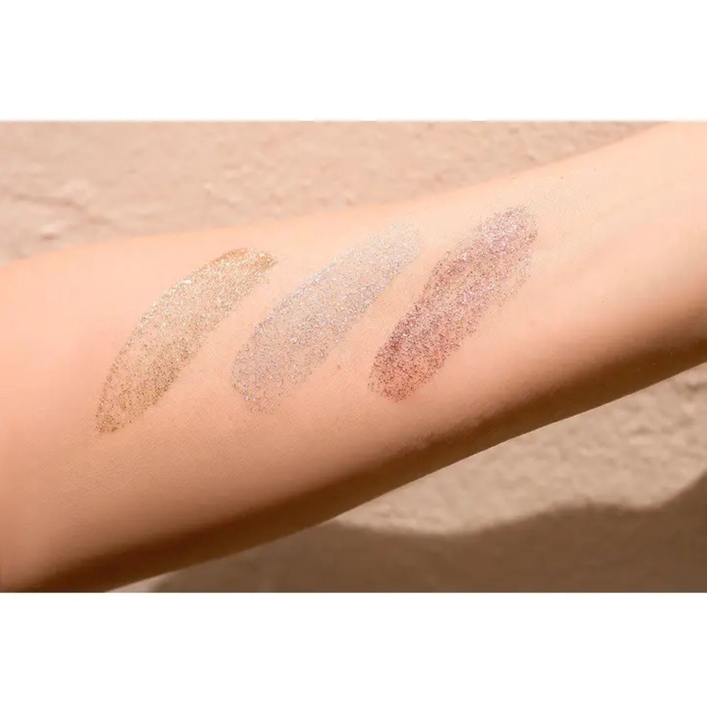 Goldie roll-on shimmer for face, hair, and body
