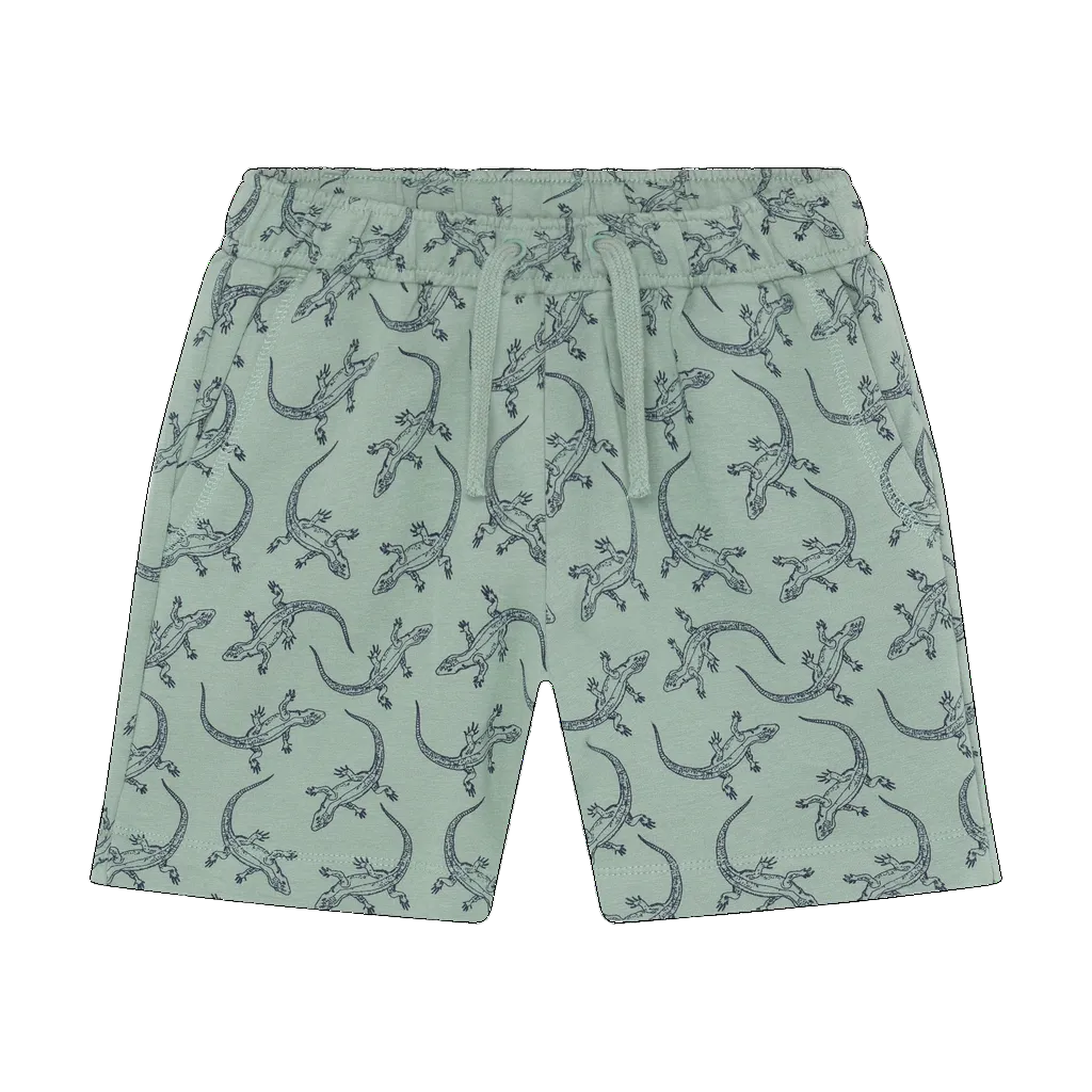 Green shorts with lizard pattern